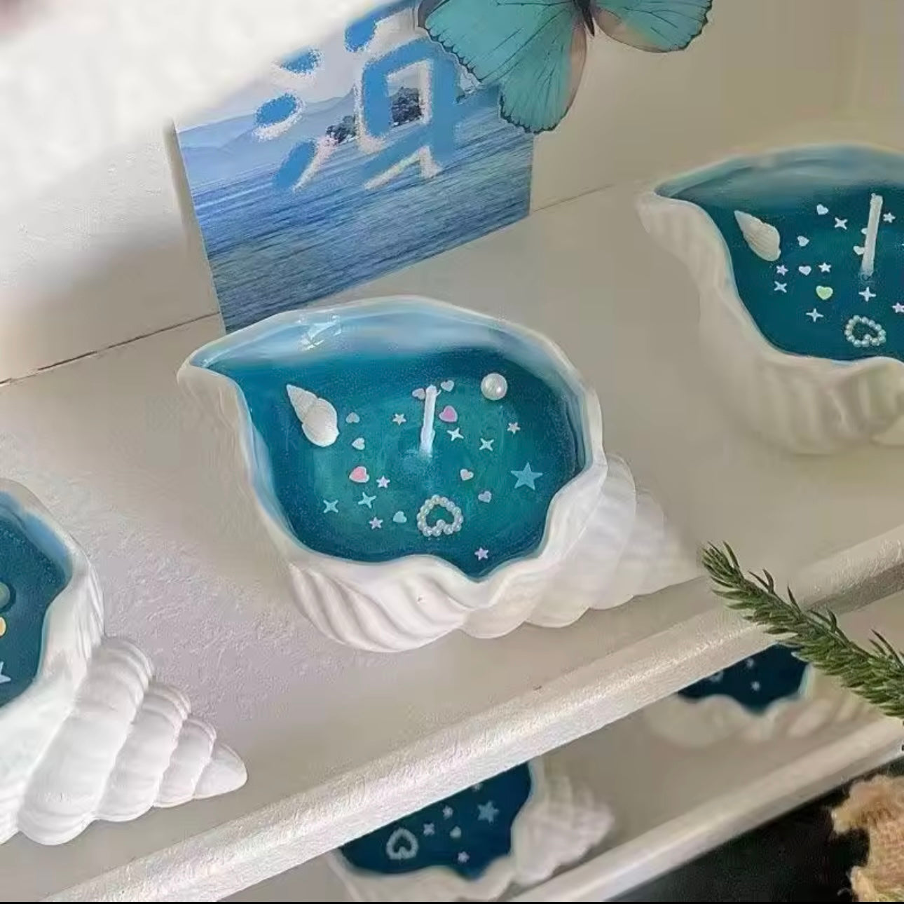 Vela aromática en forma de conchita de mar