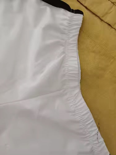Cachetero short larguito tipo tenista