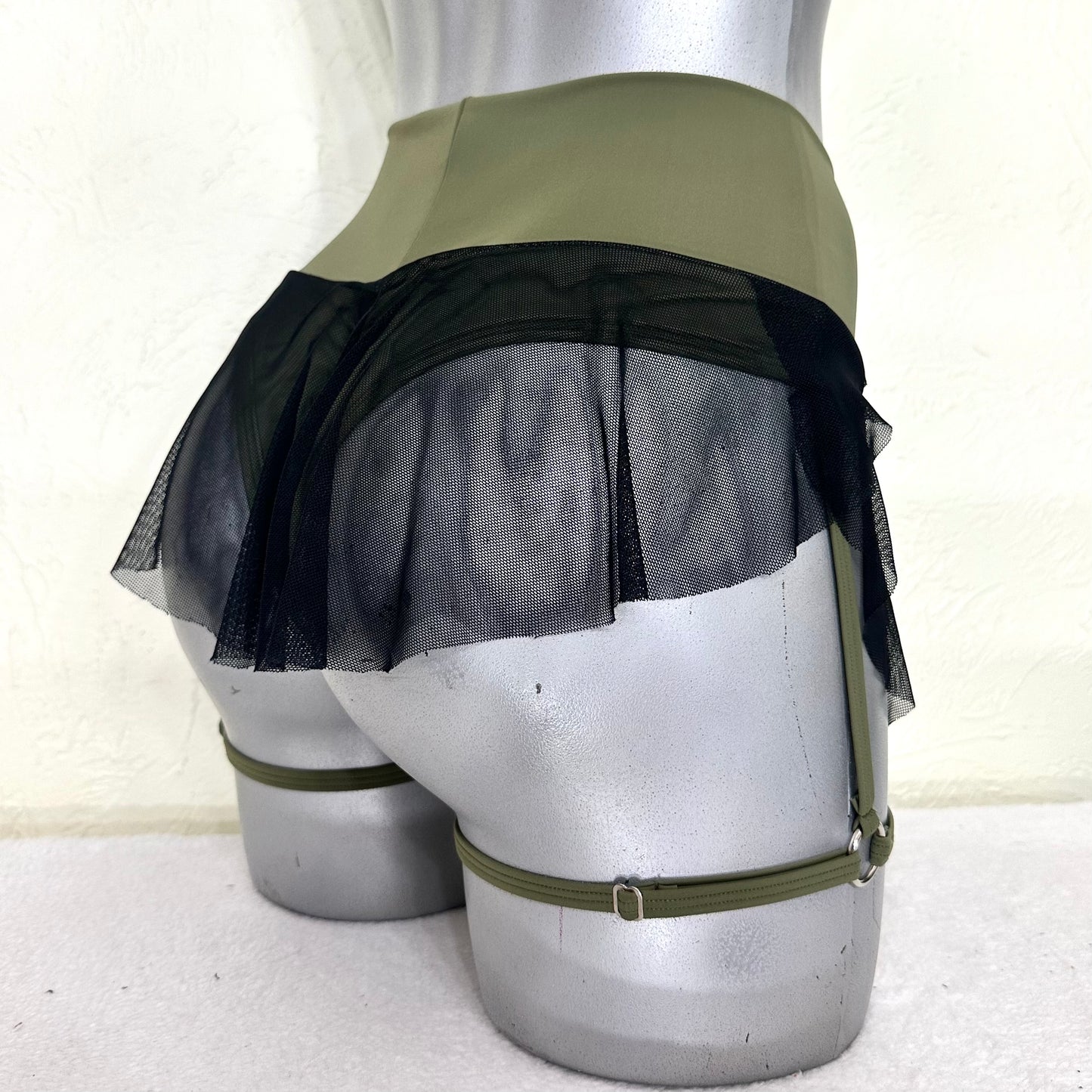 Cachetero falda arnés Elise verde militar/negro