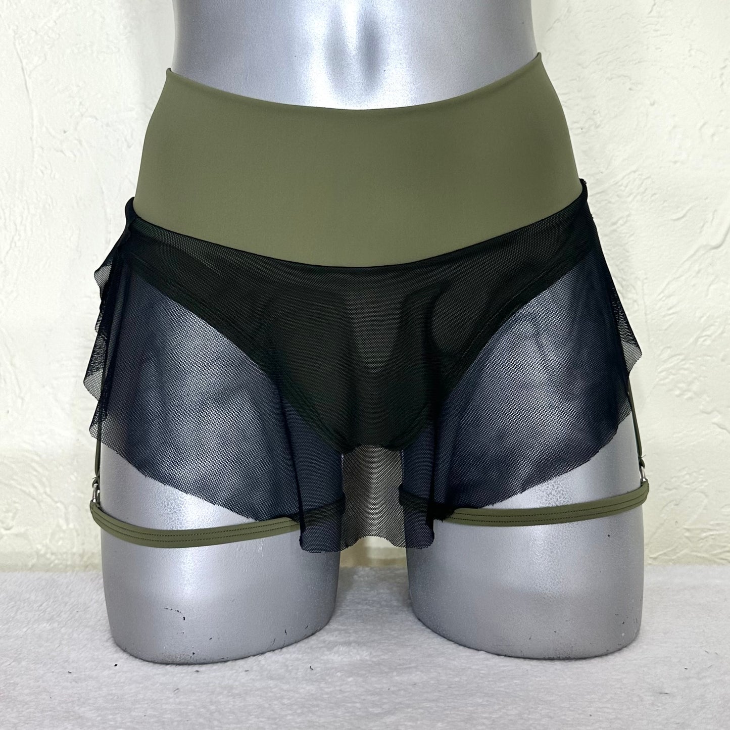 Cachetero falda arnés Elise verde militar/negro