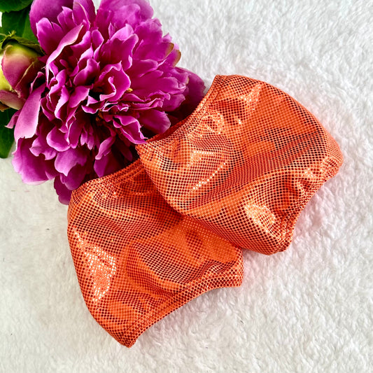 Protectores de pleasers naranja holograma