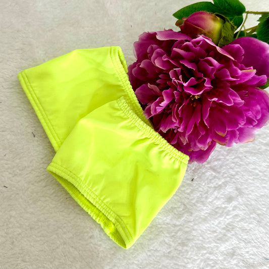 Protectores de pleasers de licra amarillos neón