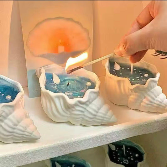 Vela aromática en forma de conchita de mar