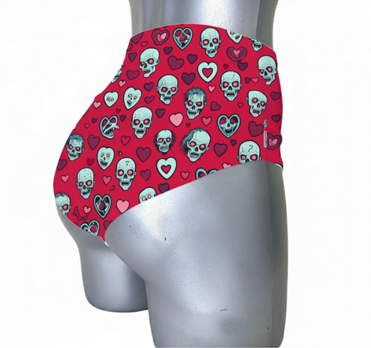 Cachetero sin arnes calaveras corazones